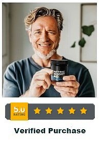 Smiling customer holding Nitric Boost